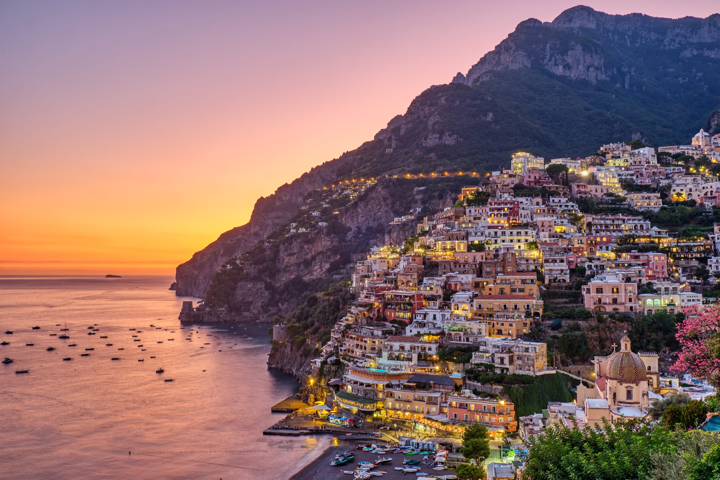 Mediterranean coastline at dusk.